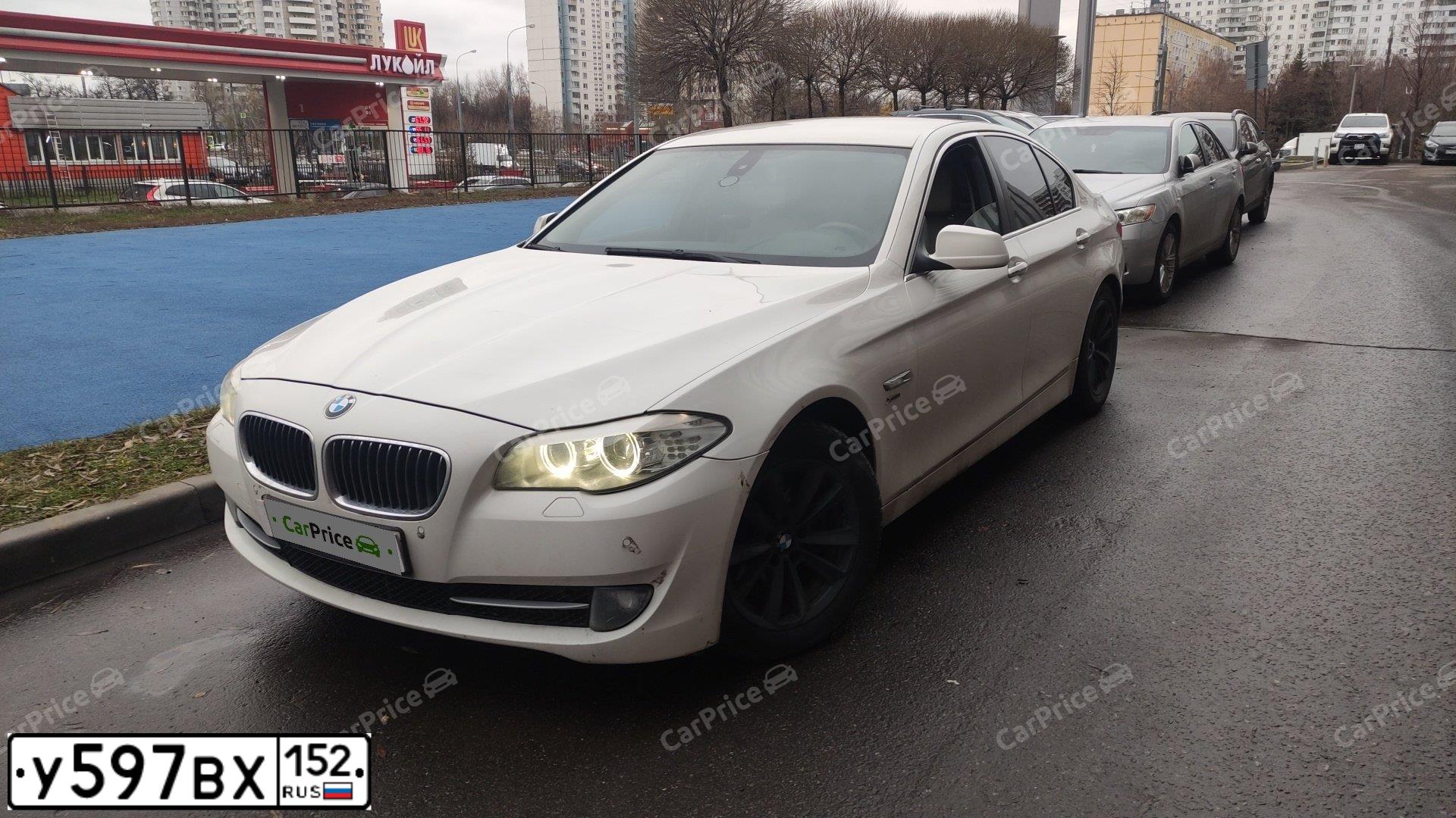 Фото автомобиля BMW SERIE 5, 2012 — госномер Т016РМ62. Цвет: Белый