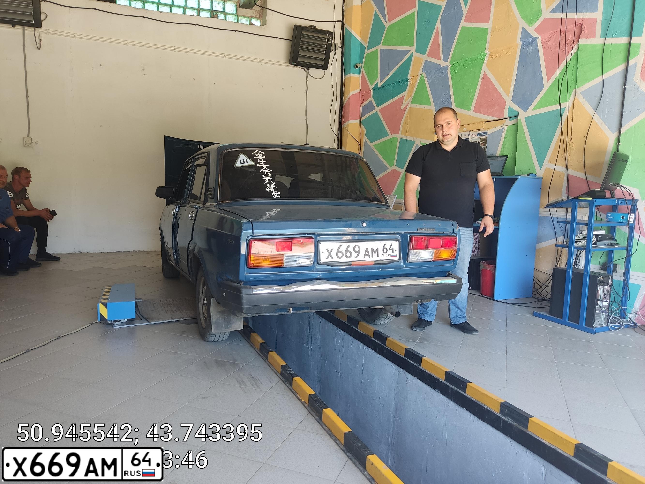 Фото автомобиля LADA 2107, 2004 — госномер Х669АМ64. Цвет: СИНЕ ЗЕЛЕНЫЙ