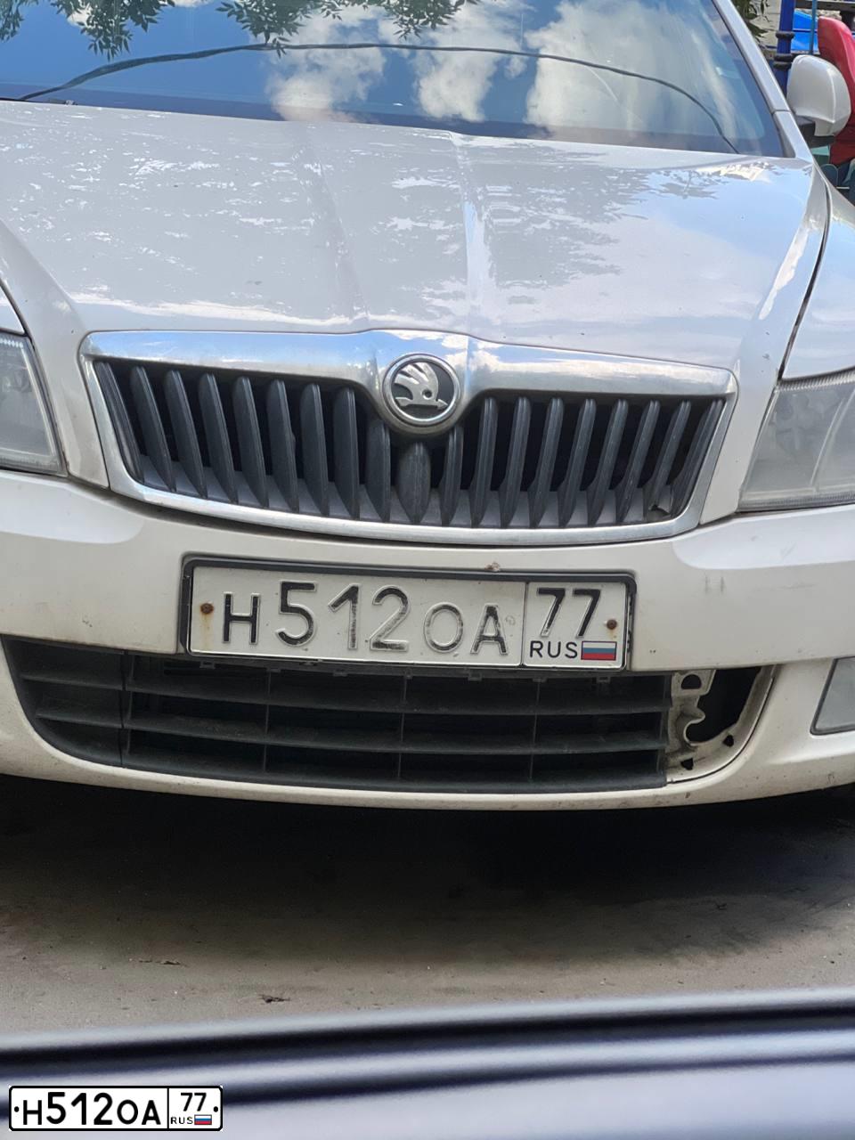 Фото автомобиля SAAB 9000, 1992 — госномер Н512ОА77. Цвет: Белый