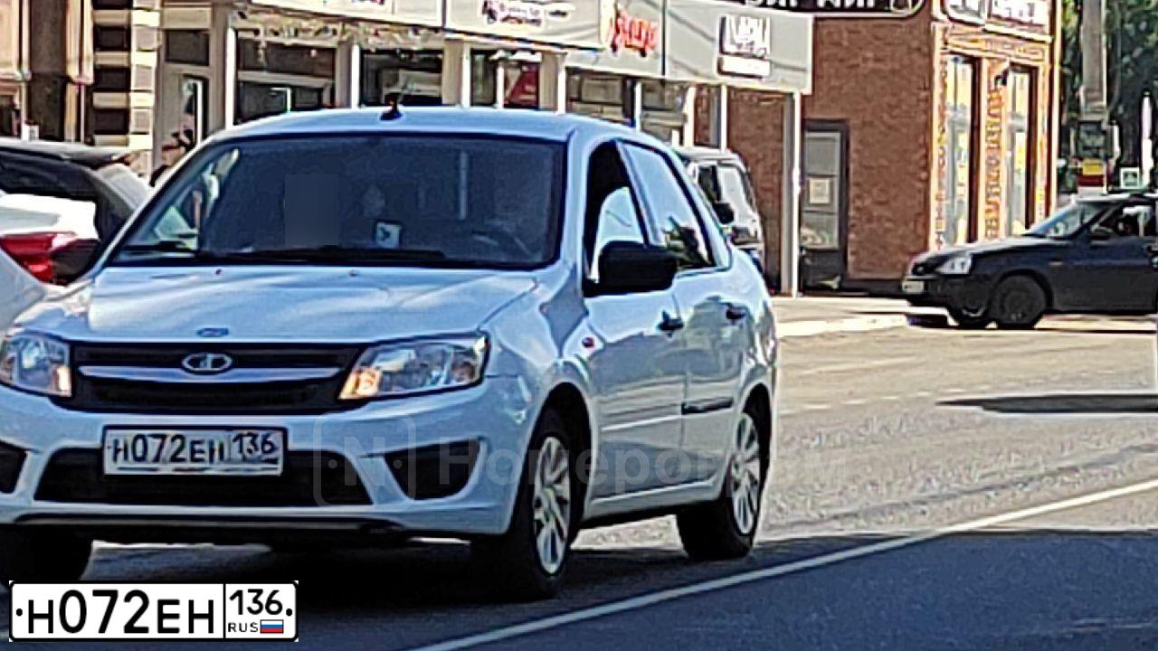Фото автомобиля LADA 2190 GRANTA, 2017 — госномер Н072ЕН136. Цвет: Белый