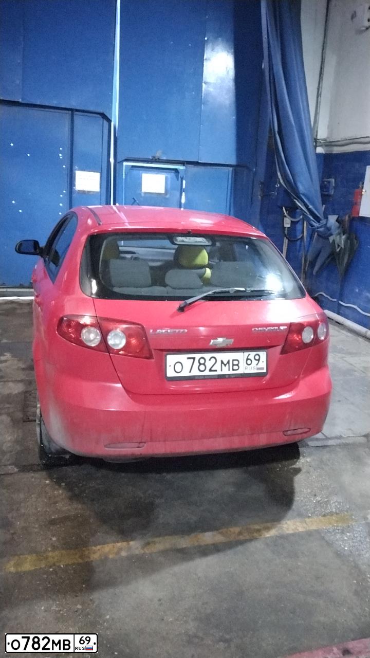 Фото автомобиля CHEVROLET LACETTI, 2005 — госномер О782МК69. Цвет: КРАСНЫЙ