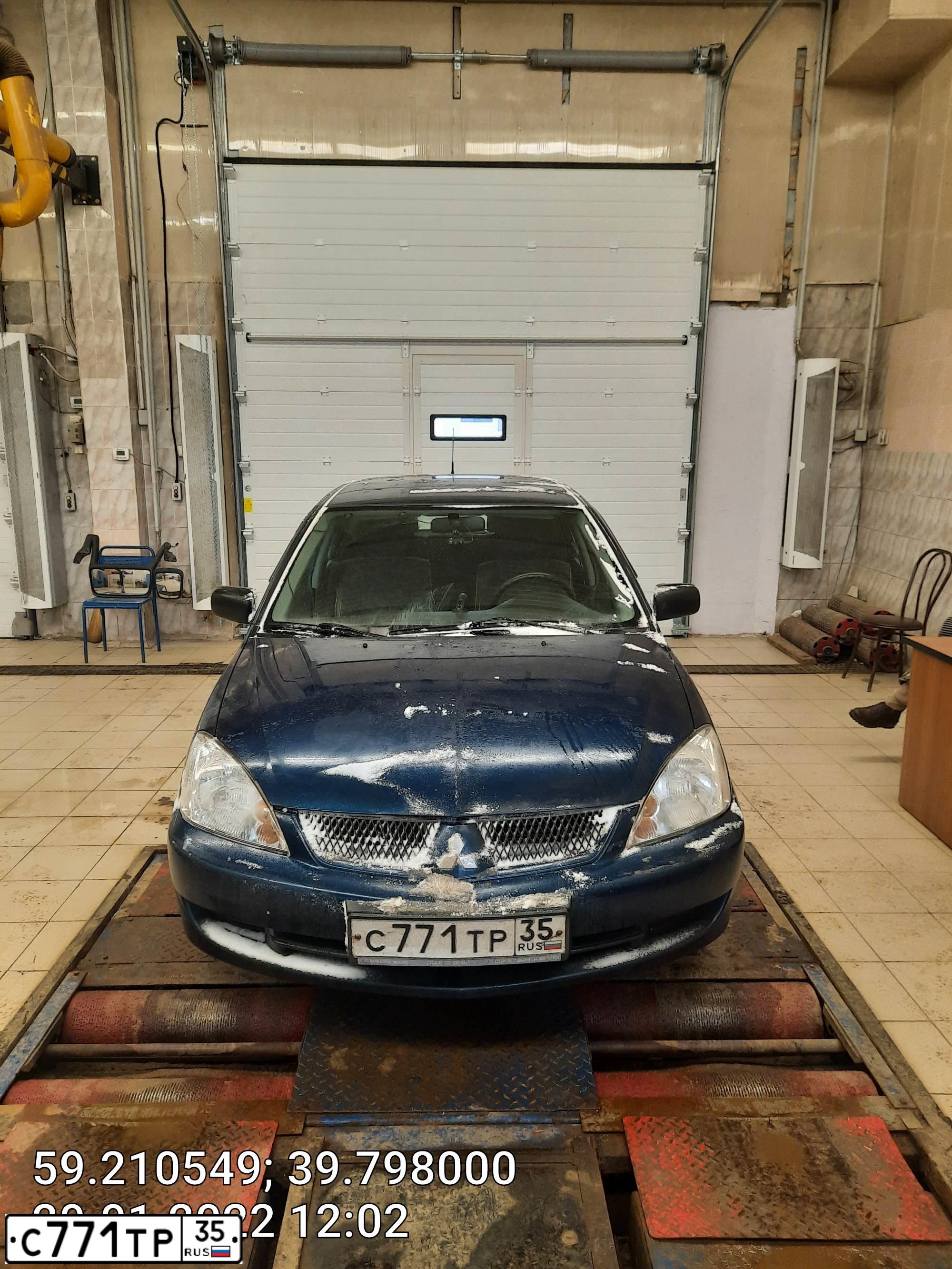 Фото автомобиля MITSUBISHI LANCER, 2005 — госномер С771ТР35. Цвет: СИНИЙ