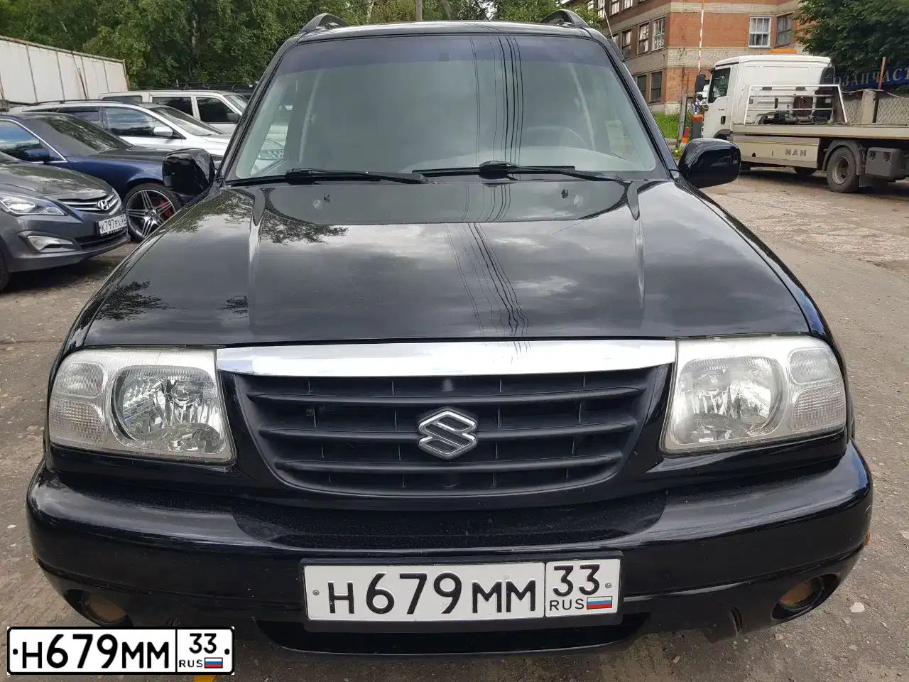 Фото автомобиля SUZUKI /GRAND/ VITARA, 2001 — госномер Н679ММ33. Цвет: ЧЕРНЫЙ