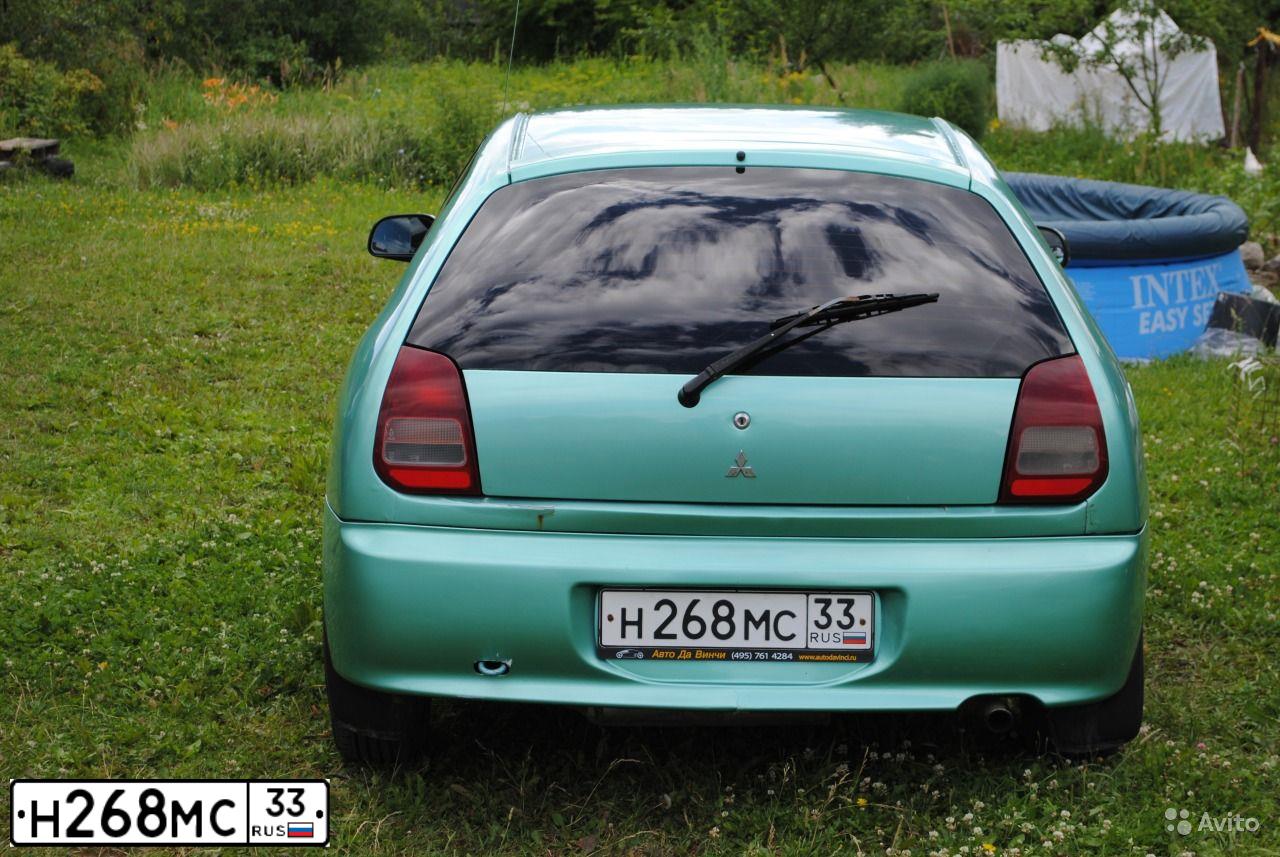 Фото автомобиля MITSUBISHI COLT, 1996 — госномер Н268МС33. Цвет: ЗЕЛЕНЫЙ