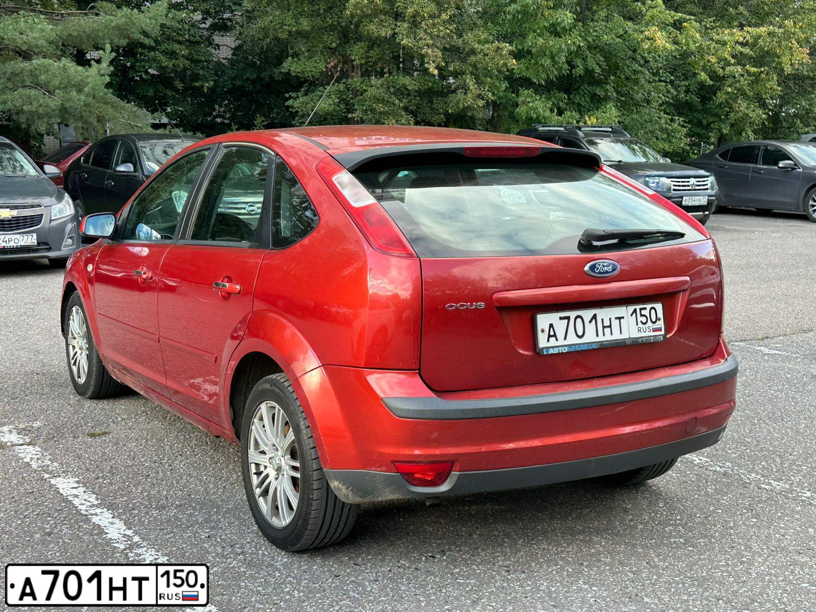 Фото автомобиля FORD FOCUS, 2007 — госномер А701НТ150. Цвет: ОРАНЖЕВЫЙ КРАСНЫЙ