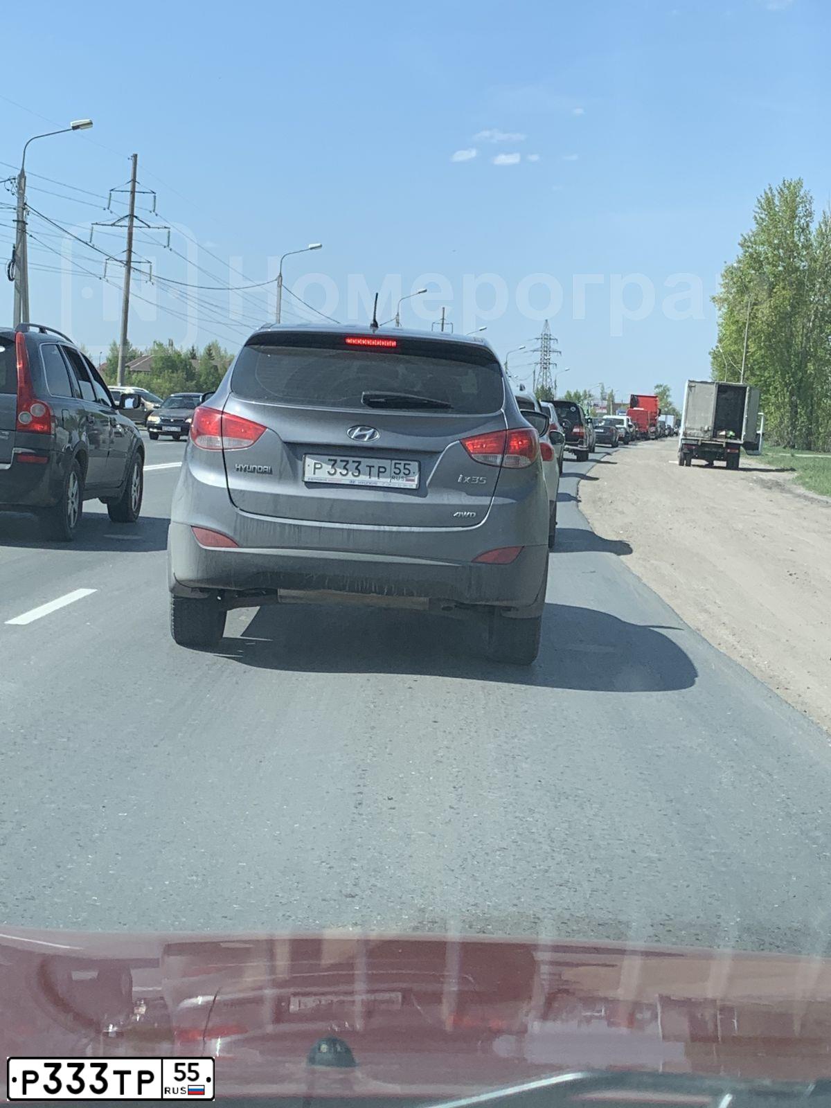 Фото автомобиля HYUNDAI IX35, 2012 — госномер Р333ТР55. Цвет: Серый