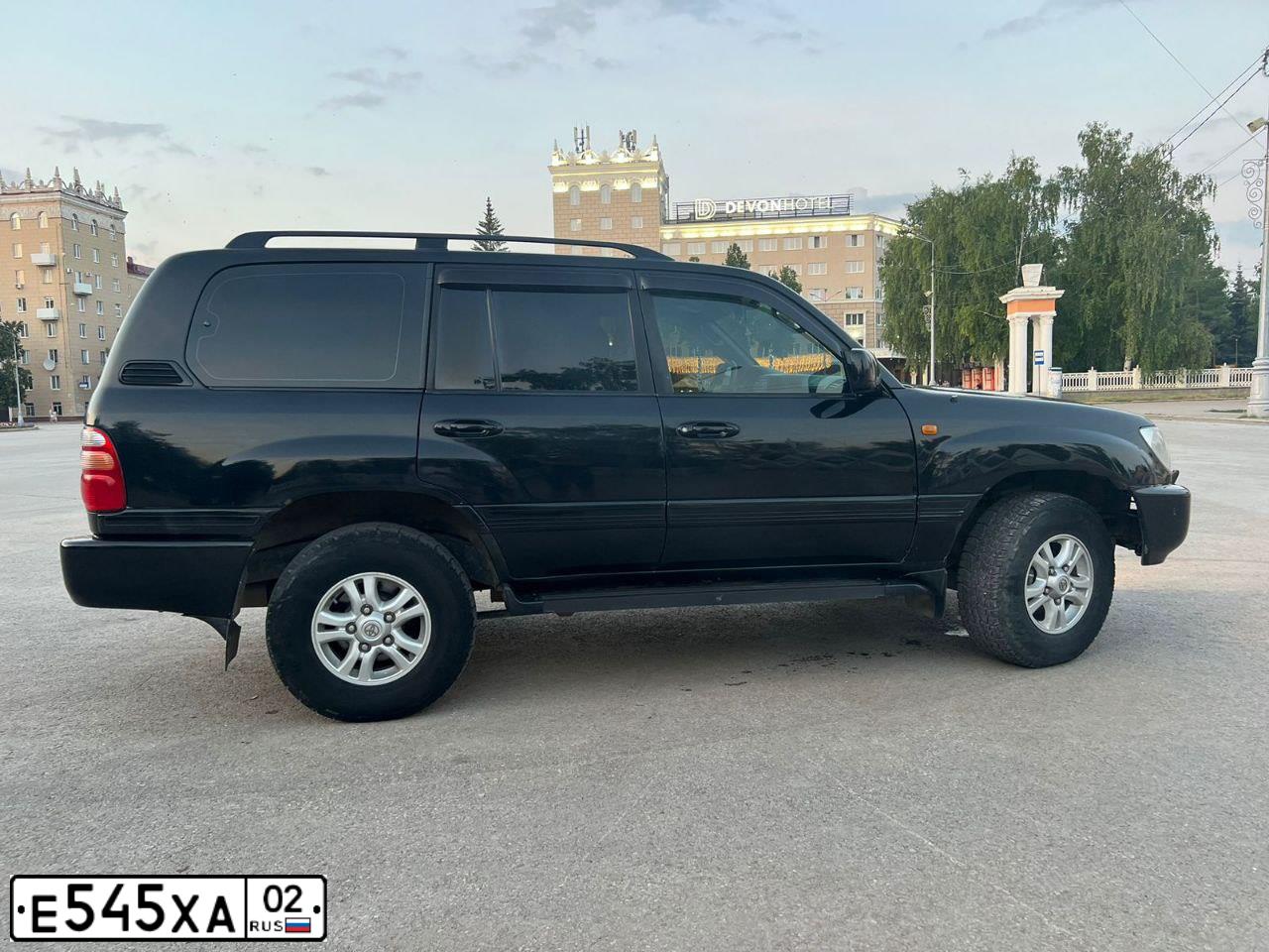 Фото автомобиля LADA 2104, 2000 — госномер Е545ХА02. Цвет: ЯРКО-БЕЛЫЙ