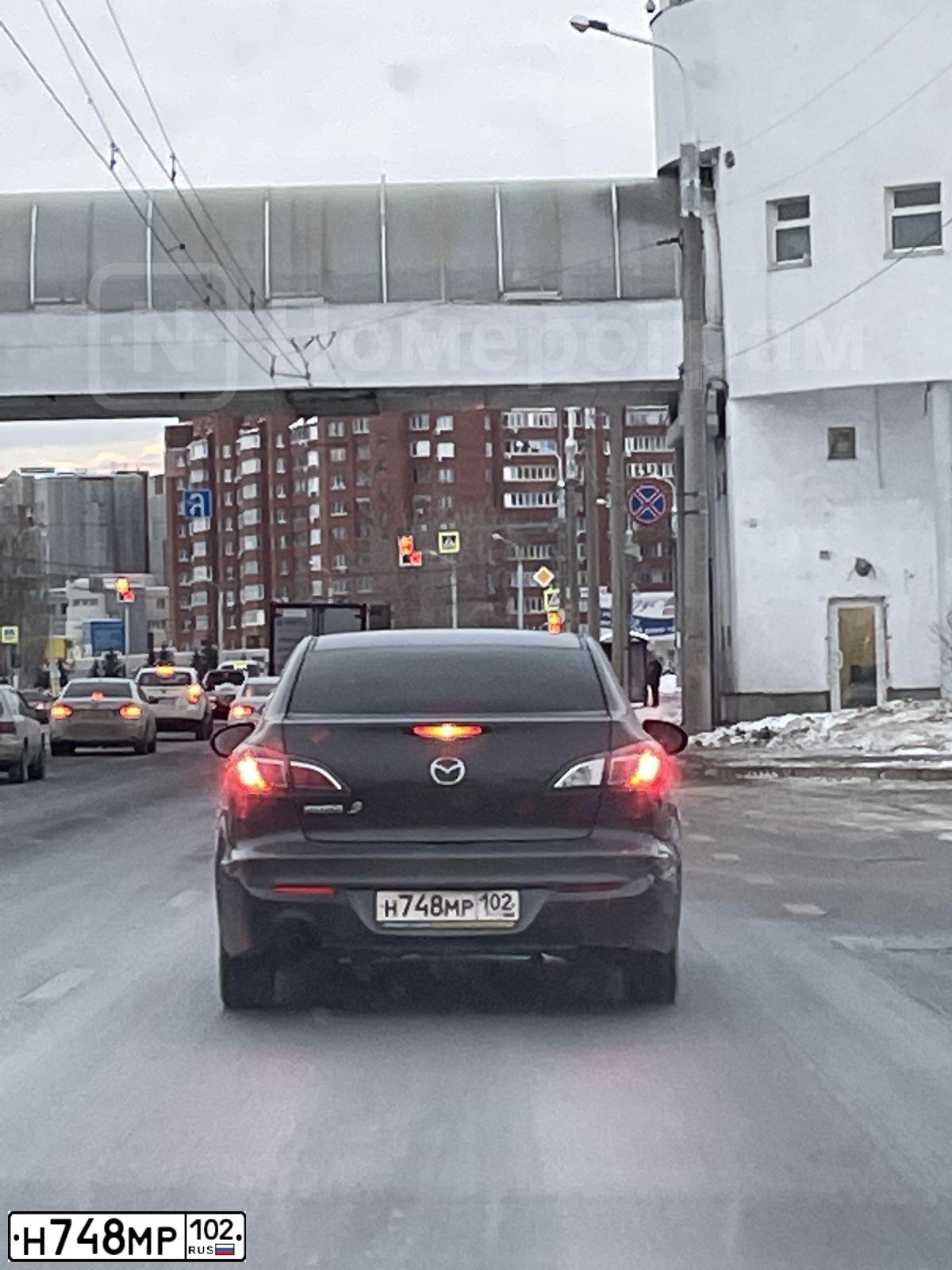 Фото автомобиля MAZDA 3, 2011 — госномер Н748МР102. Цвет: ТЕМНО-СЕРЫЙ