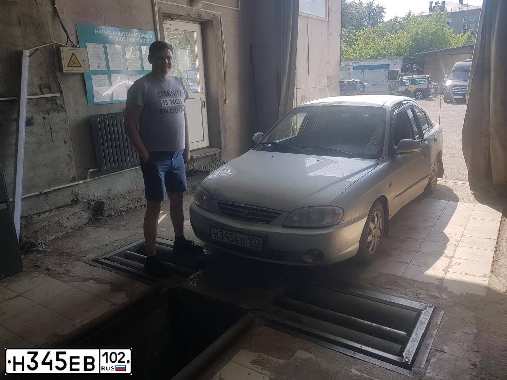 Фото автомобиля KIA SPECTRA, 2009 — госномер Н345ЕВ102. Цвет: АЛМАЗНОЕ СЕРЕБРО
