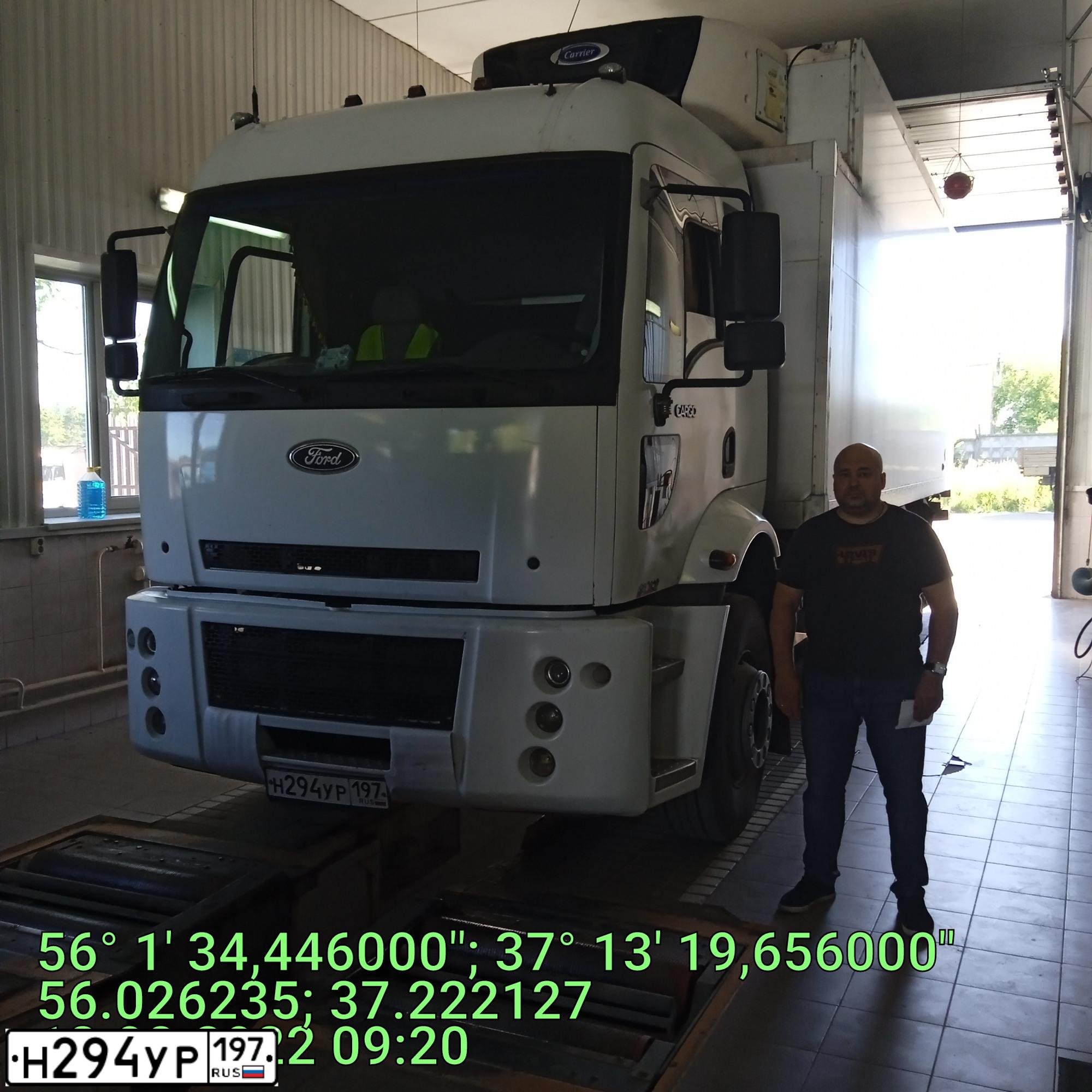 Фото автомобиля FORD CARGO, 2009 — госномер А702АЕ550. Цвет: Белый