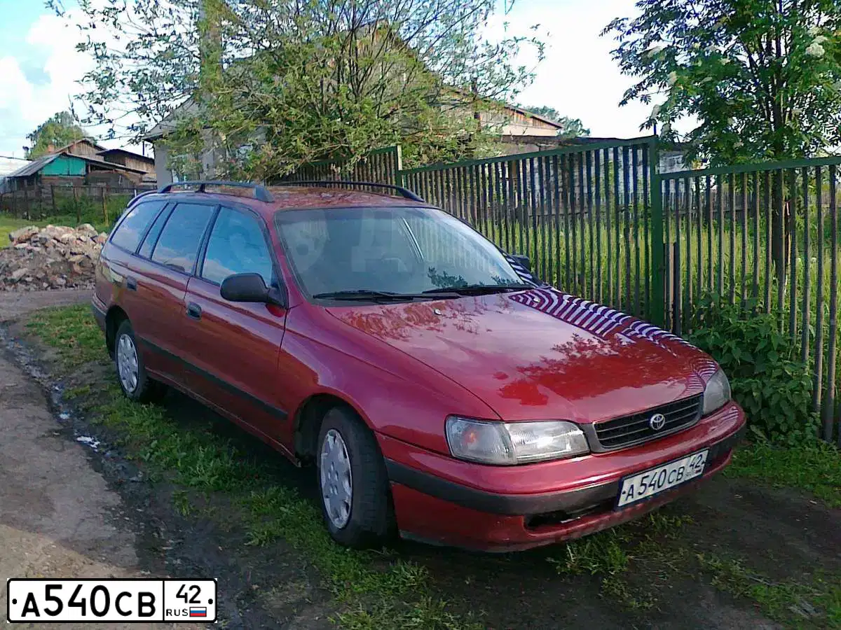 Фото автомобиля TOYOTA CARINA, 1996 — госномер А540СВ42. Цвет: ТЕМНО-КРАСНЫЙ