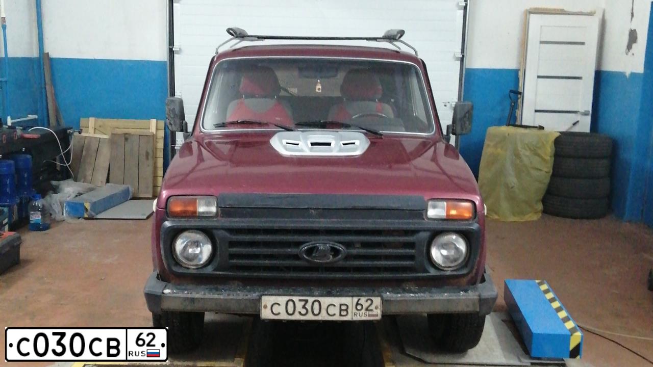 Фото автомобиля LADA 2121 NIVA, 2002 — госномер С030СВ62. Цвет: ВИШНЕВЫЙ ТЕМНЫЙ