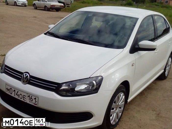 Фото автомобиля VOLKSWAGEN POLO, 2012 — госномер А169ЕК761. Цвет: Белый