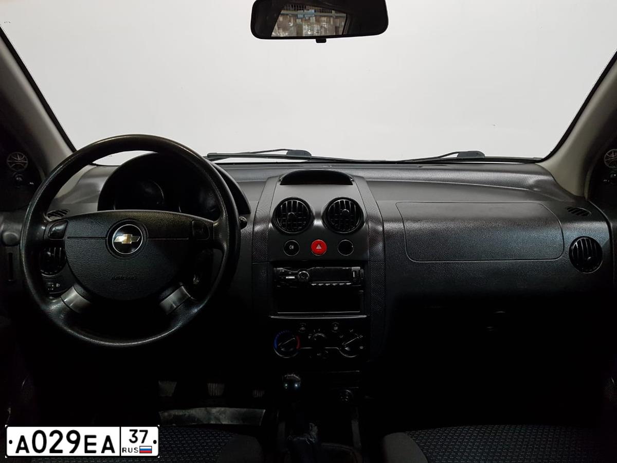 Фото автомобиля CHEVROLET AVEO, 2007 — госномер О546ТУ44. Цвет: Красный