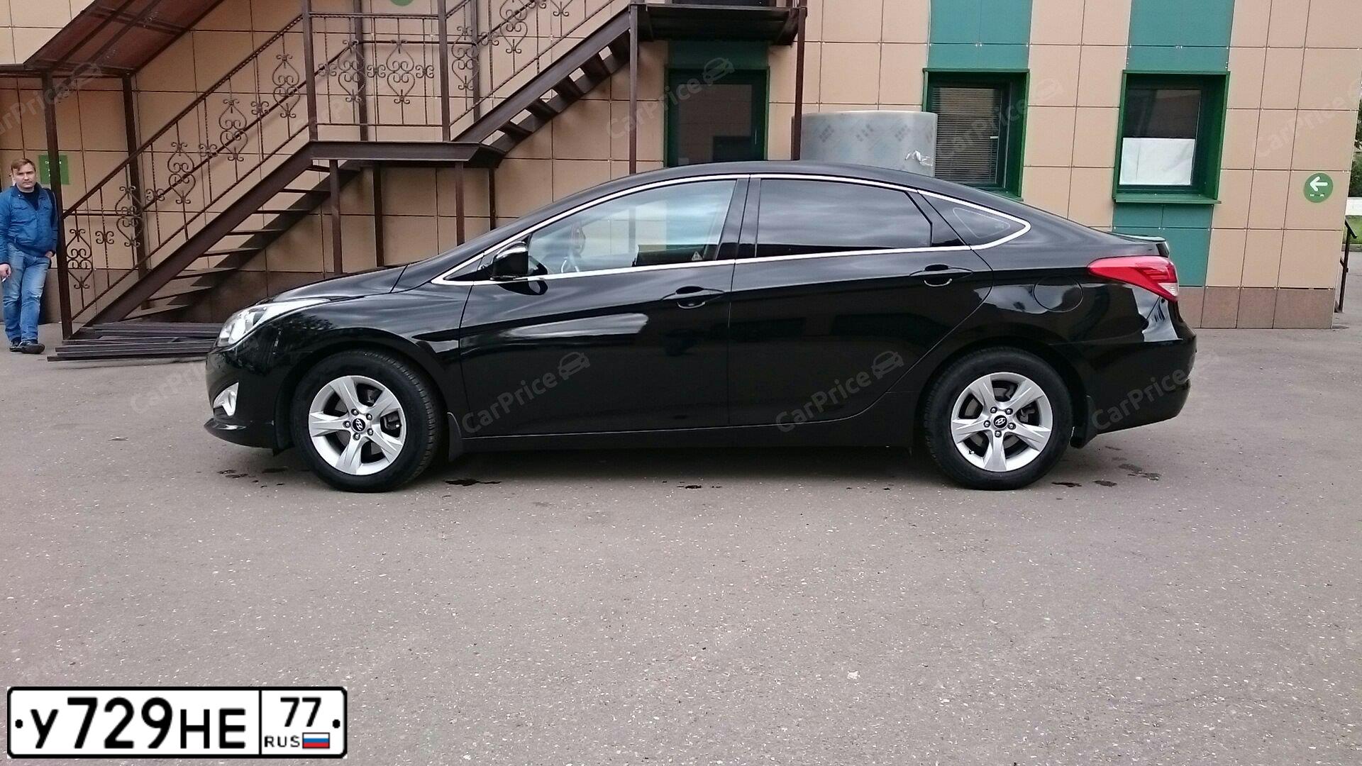 Фото автомобиля HYUNDAI I40, 2014 — госномер У729НЕ77. Цвет: ЧЕРНЫЙ