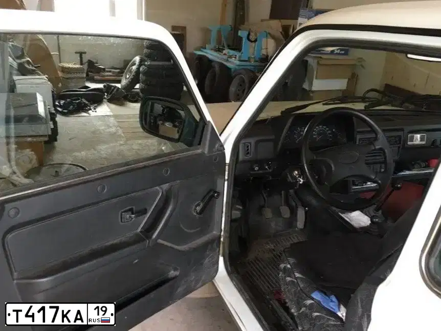 Фото автомобиля LADA 2121 NIVA, 2013 — госномер Т417КА19. Цвет: ЯРКО-БЕЛЫЙ