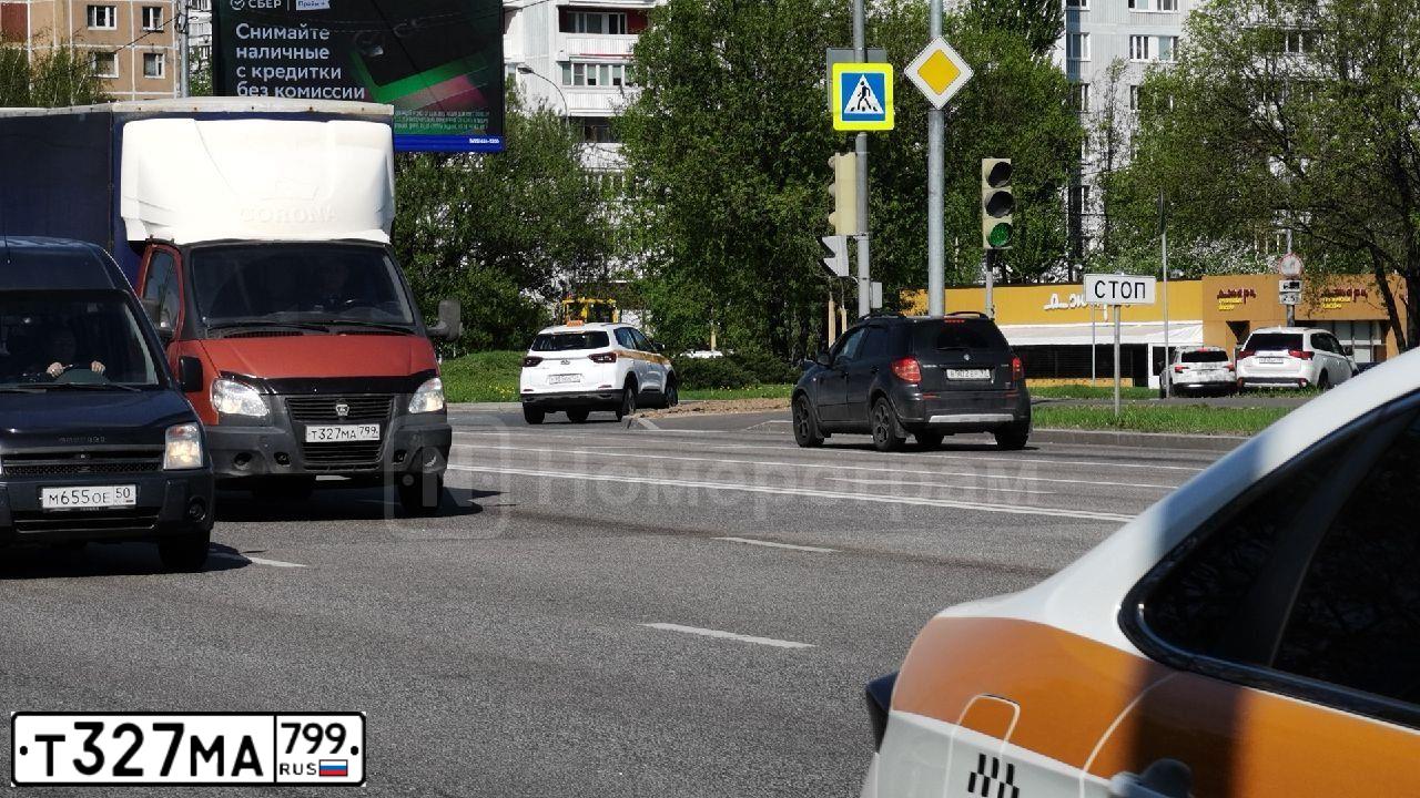 Фото автомобиля GAZ 3302 EL, 2011 — госномер Т327МА799. Цвет: ОРАНЖЕВЫЙ