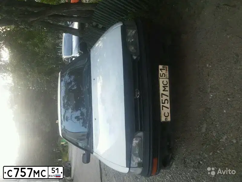 Фото автомобиля TOYOTA COROLLA, 1991 — госномер А867ЕМ51. Цвет: Белый
