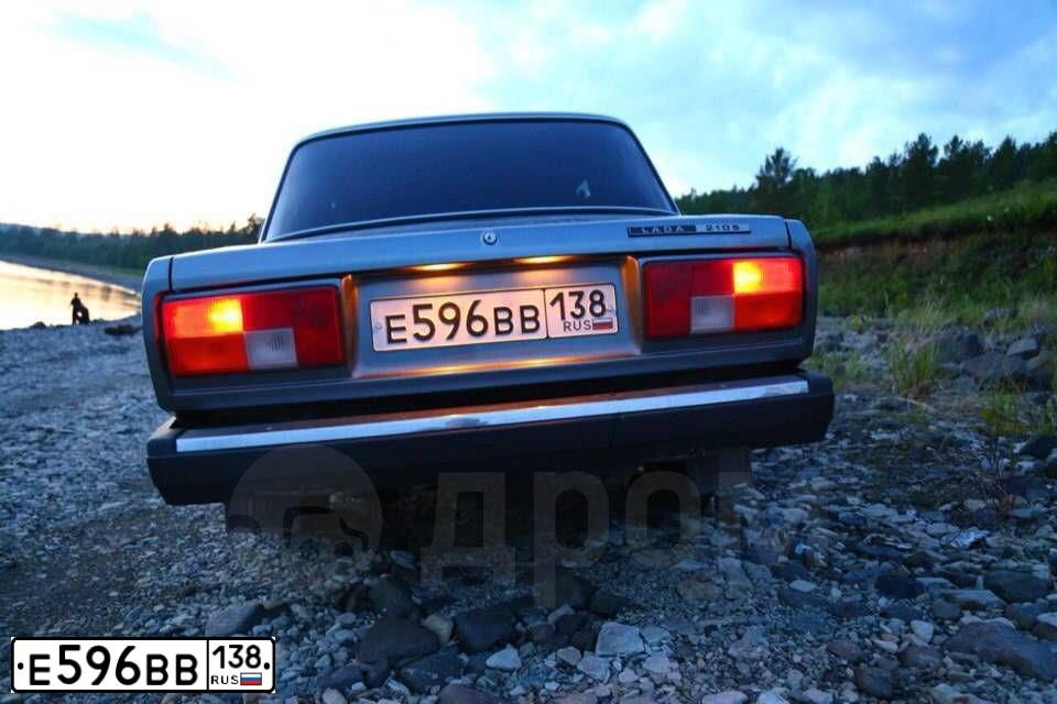 Фото автомобиля LADA 2105 LADA, 2010 — госномер Е596ВВ138. Цвет: СРЕДНИЙ СЕРО-ЗЕЛЕН
