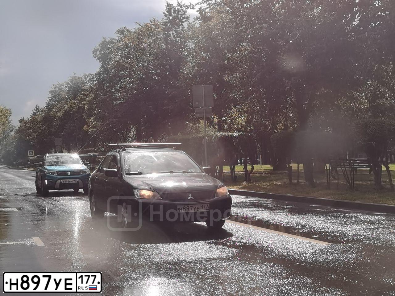 Фото автомобиля MITSUBISHI LANCER, 2007 — госномер Н897УЕ177. Цвет: ЧЕРНЫЙ