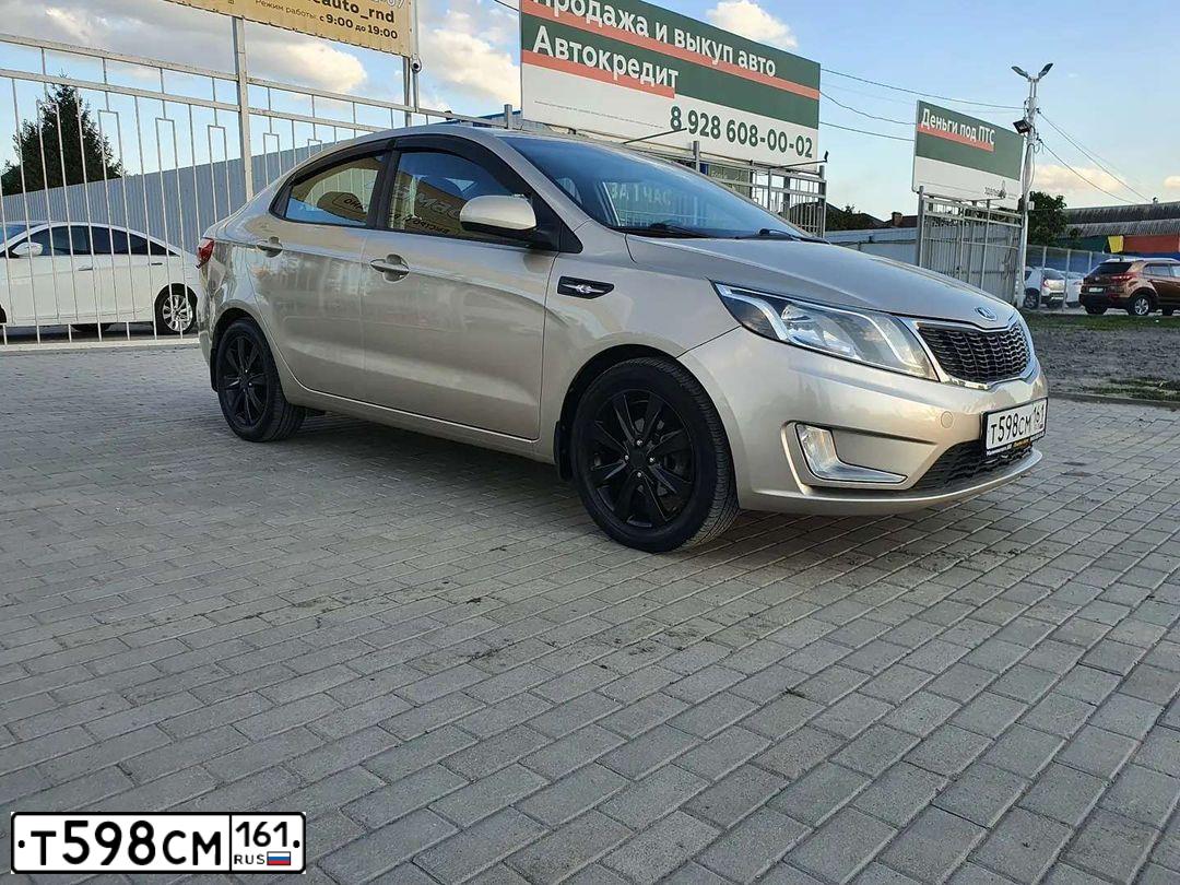 Фото автомобиля KIA RIO, 2014 — госномер Т598СМ161. Цвет: БЕЖЕВЫЙ