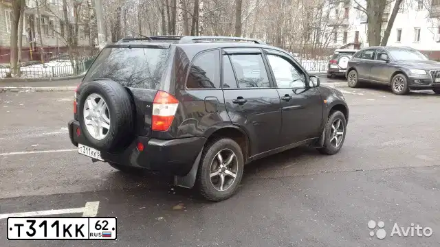 Фото автомобиля CHEVROLET NIVA, 2006 — госномер Т311КК62. Цвет: Темно-серый металлик