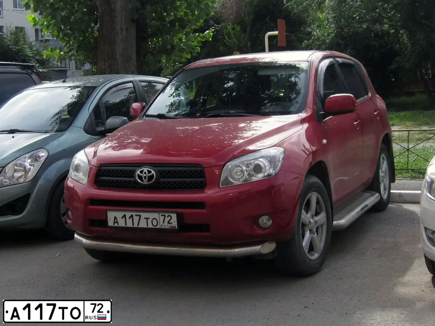 Фото автомобиля TOYOTA RAV4, 2006 — госномер А117ТО72. Цвет: КРАСНЫЙ