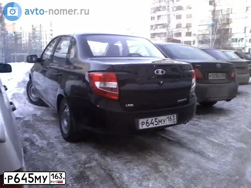 Фото автомобиля LADA GRANTA, 2012 — госномер М983КС164. Цвет: Сине-Черный