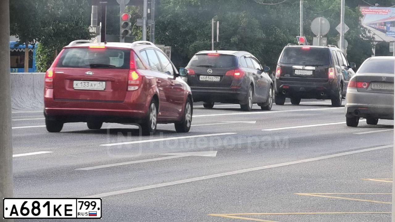 Фото автомобиля OPEL ASTRA, 2012 — госномер А590ТВ67. Цвет: Коричневый