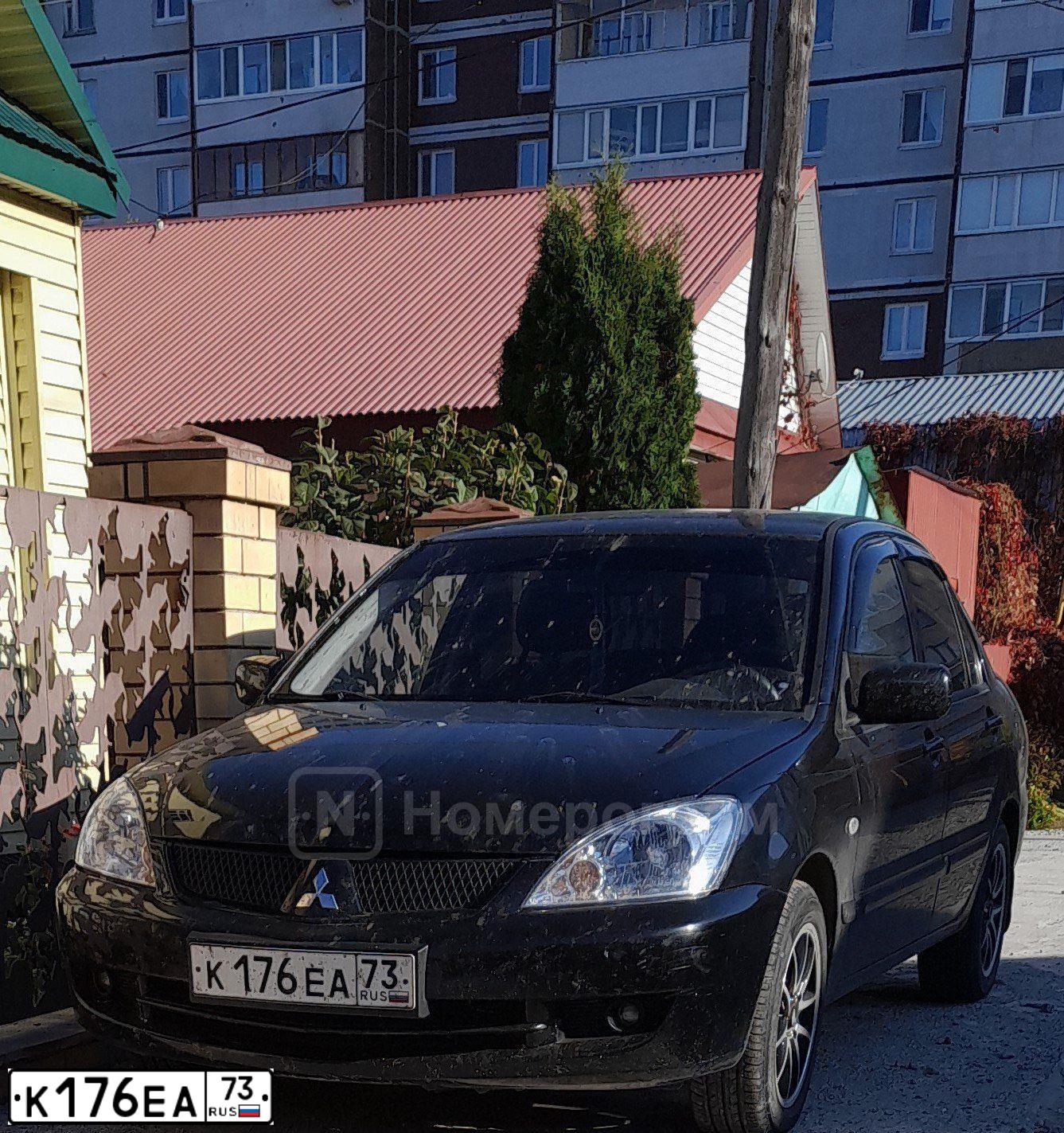 Фото автомобиля MITSUBISHI  LANCER 1.6, 2006 — госномер Х185ОК763. Цвет: ЧЕРНЫЙ