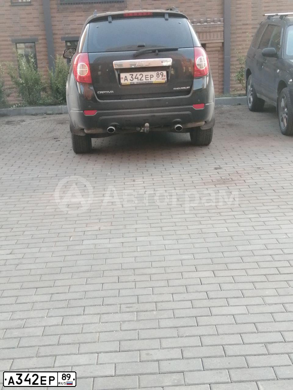 Фото автомобиля CHEVROLET CAPTIVA, 2008 — госномер Р933ТМ154. Цвет: ЧЕРНЫЙ