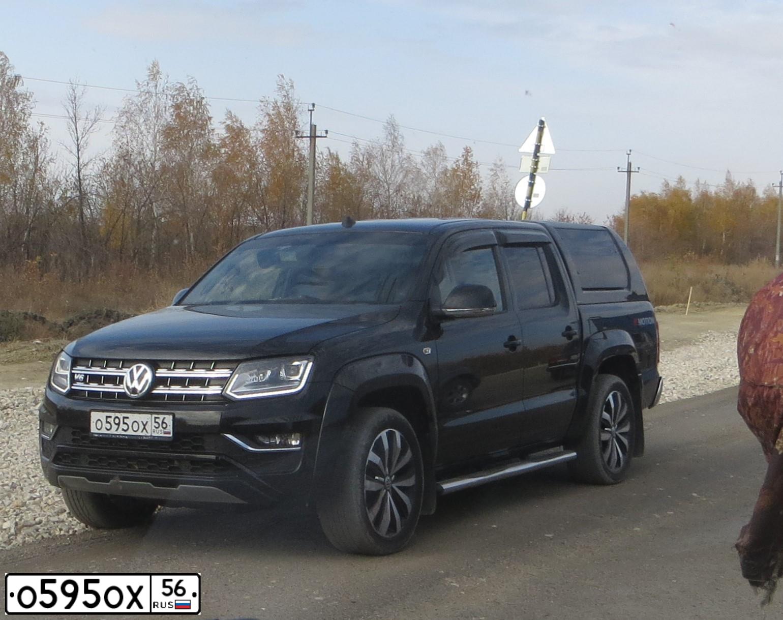Фото автомобиля MITSUBISHI PAJERO SPORT, 2008 — госномер О595ОХ56. Цвет: ЗЕЛЕНЫЙ