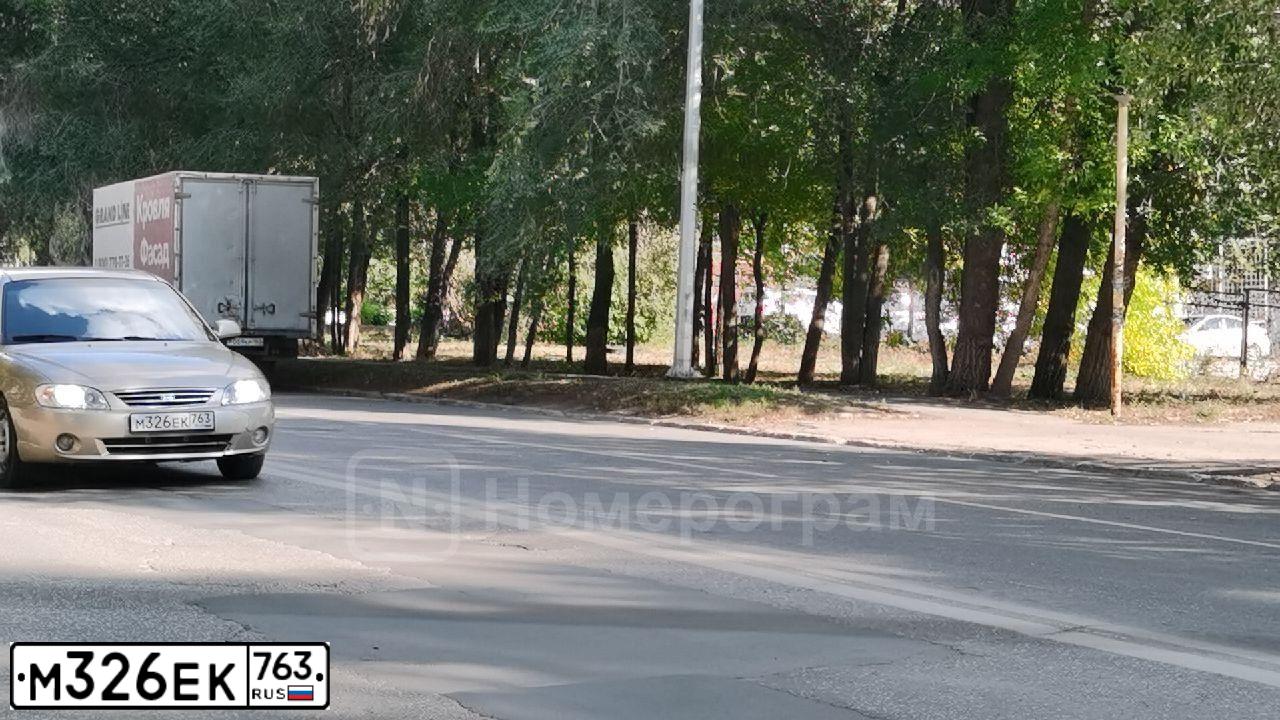 Фото автомобиля KIA SPECTRA, 2008 — госномер У230АА163. Цвет: Золотисто-бежевый