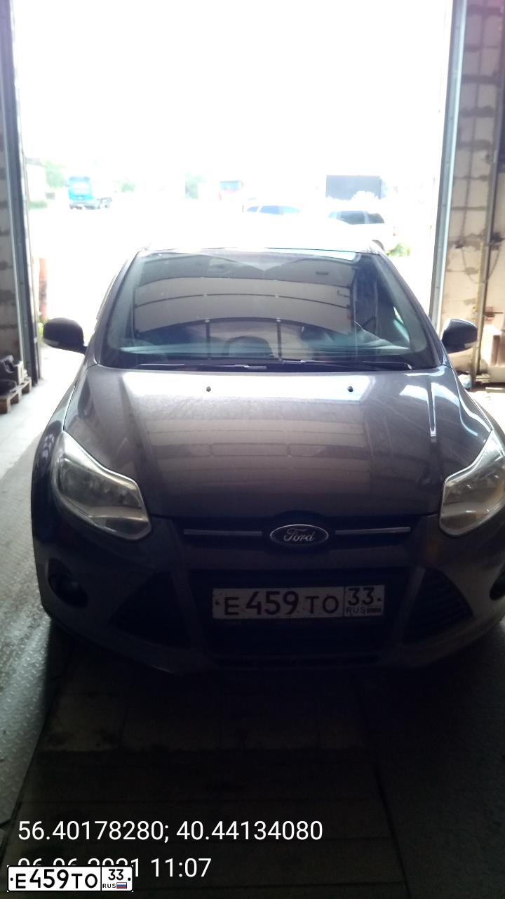 Фото автомобиля FORD FOCUS, 2012 — госномер Е459ТО33. Цвет: СЕРО-КОРИЧНЕВЫЙ