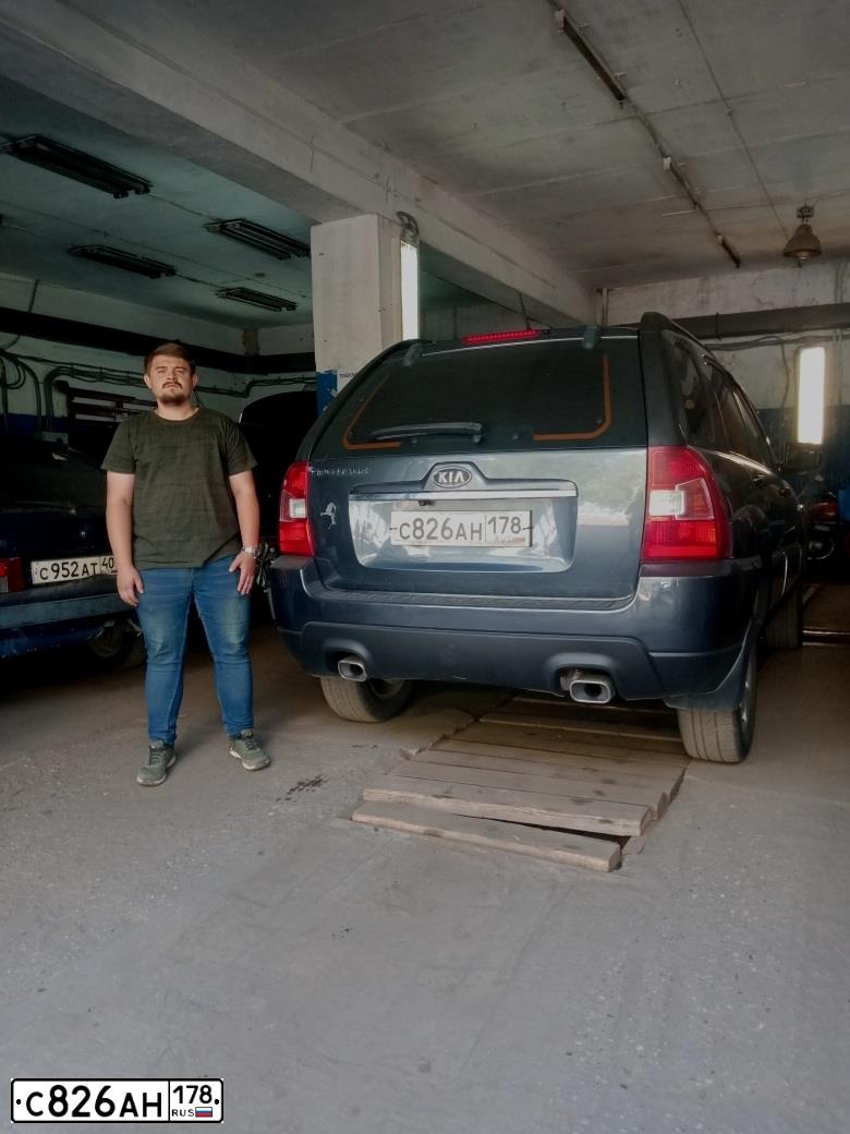 Фото автомобиля KIA SPORTAGE, 2010 — госномер С826АН178. Цвет: СЕРЫЙ