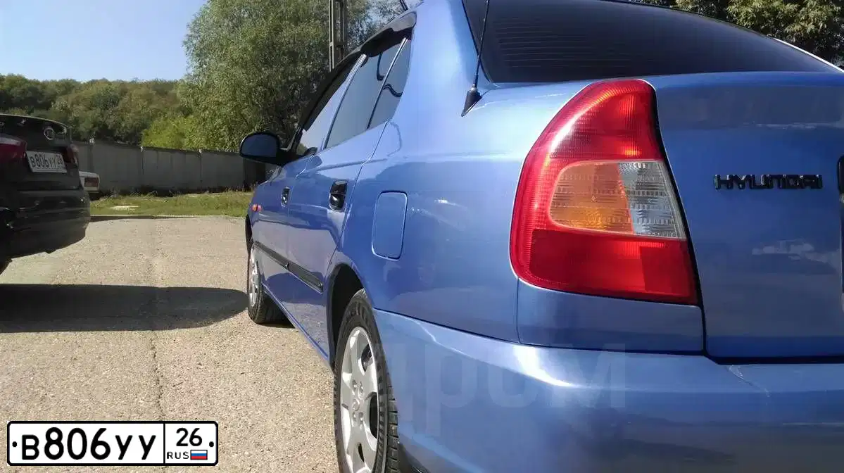 Фото автомобиля KIA RIO, 2012 — госномер В806УУ26. Цвет: ЧЕРНЫЙ