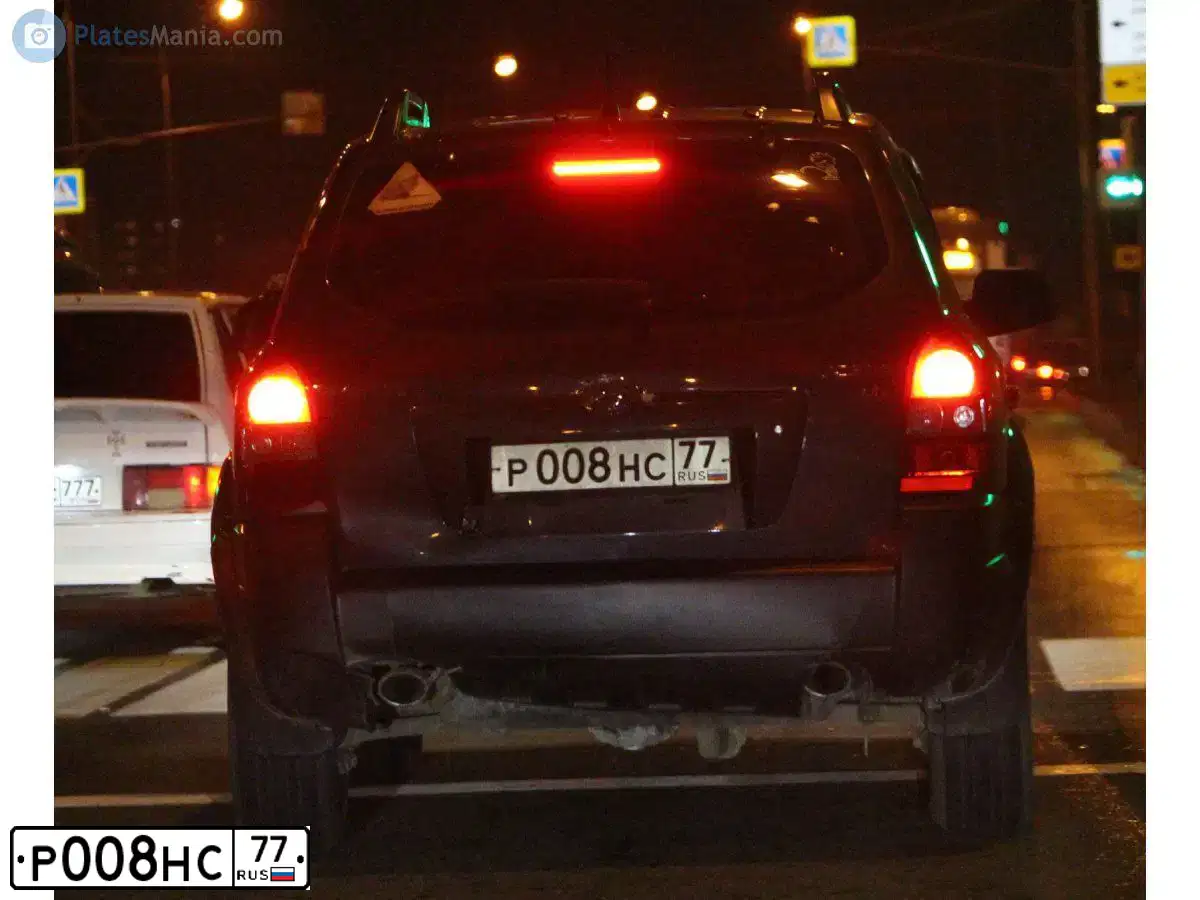 Фото автомобиля HYUNDAI TUCSON, 2006 — госномер Р008НС77. Цвет: СЕРЫЙ ТЕМНЫЙ