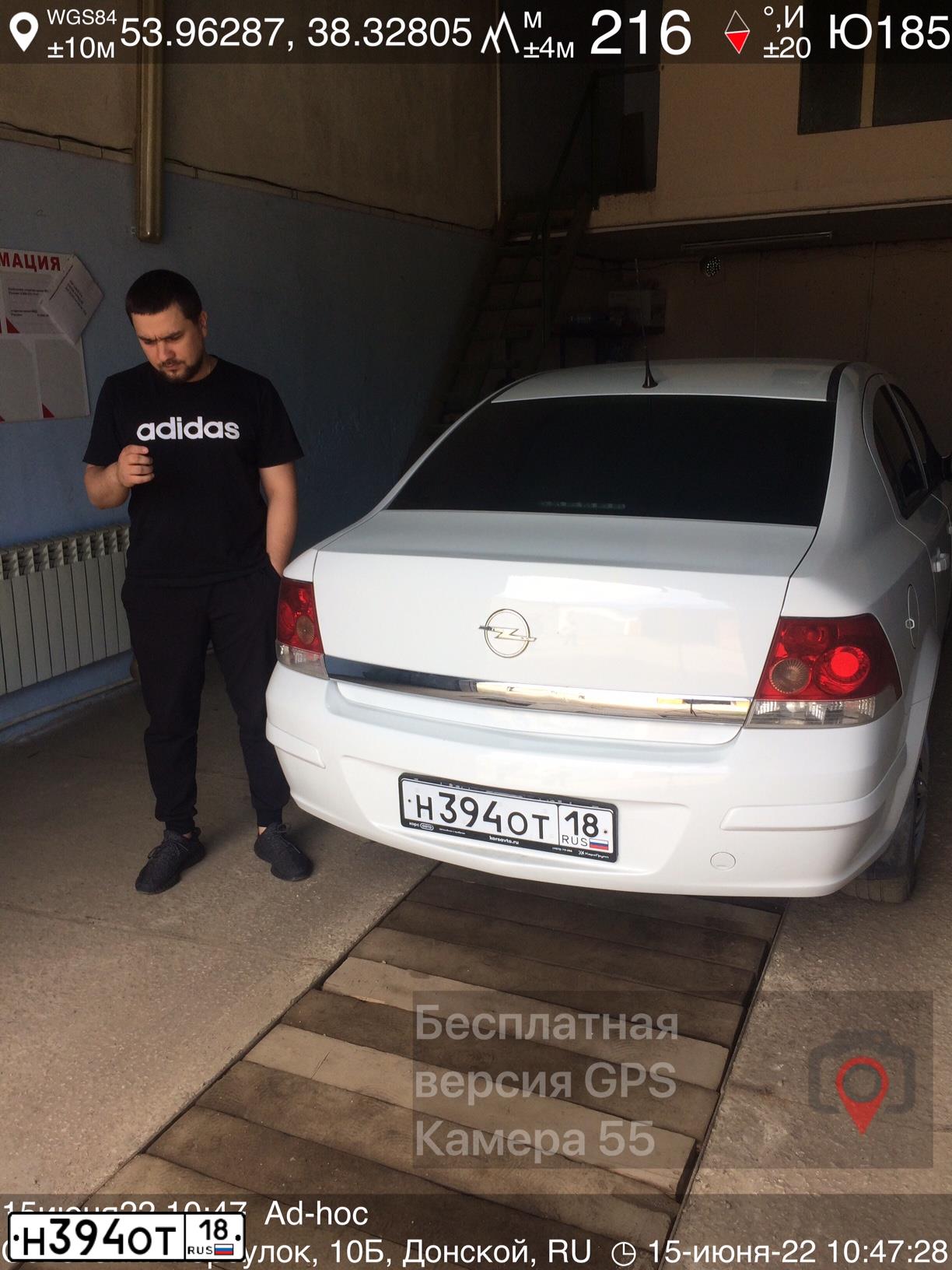 Фото автомобиля OPEL ASTRA, 2012 — госномер Х321ЕА31