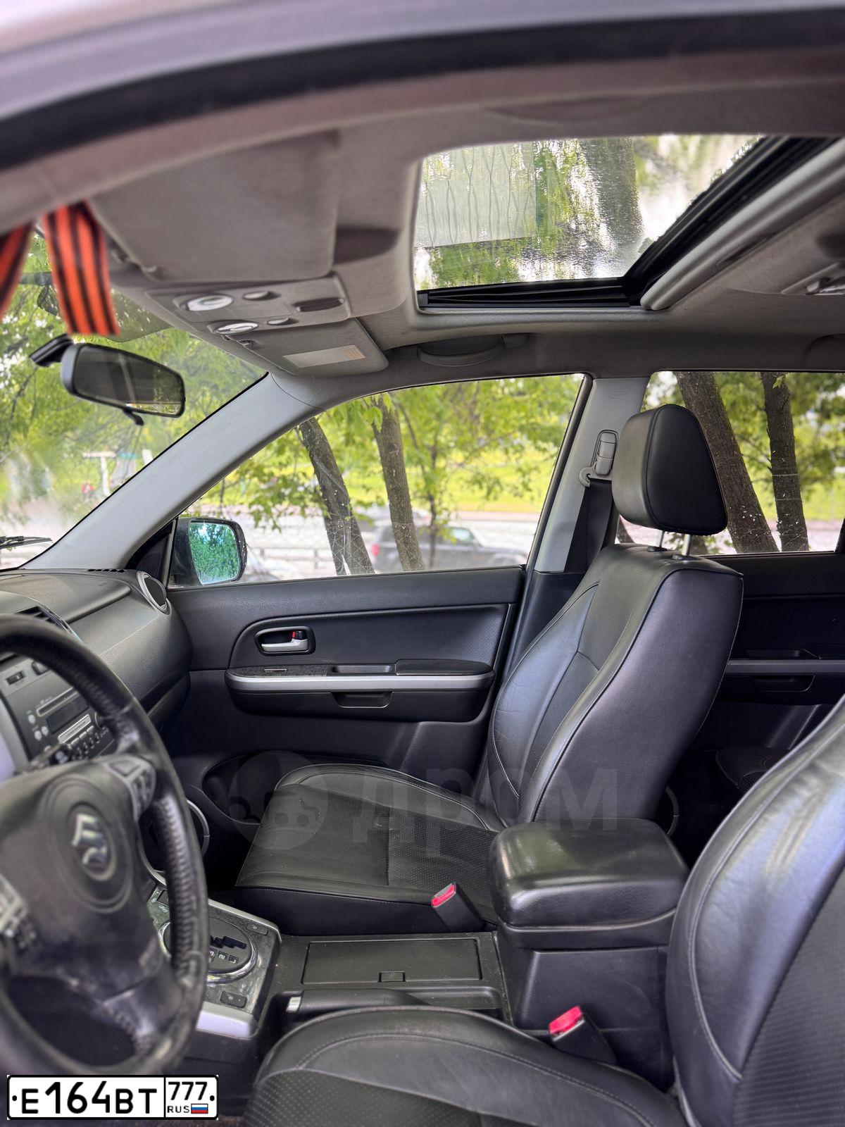 Фото автомобиля SUZUKI /GRAND/ VITARA, 2010 — госномер Е164ВТ777. Цвет: СЕРЫЙ