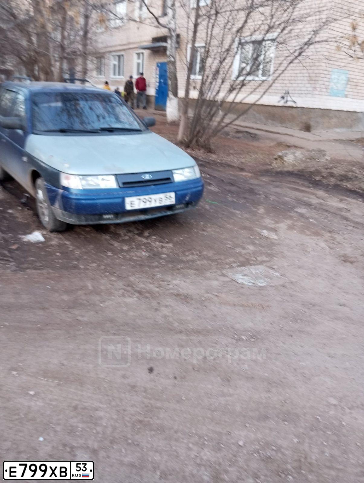 Фото автомобиля KIA SPORTAGE, 2011 — госномер Е799ХВ53. Цвет: СЕРЫЙ
