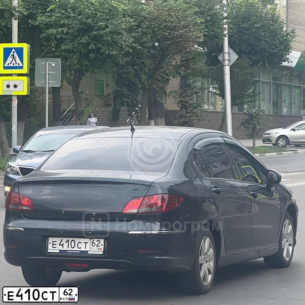 Фото автомобиля PEUGEOT 408, 2012 — госномер Е410СТ62. Цвет: ТЕМНО-СИНИЙ