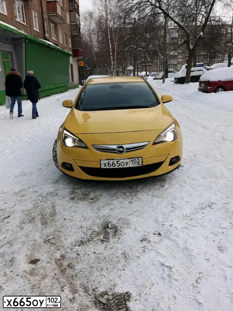 Фото автомобиля OPEL ASTRA, 2011 — госномер Х734УА56. Цвет: ЖЁЛТЫЙ