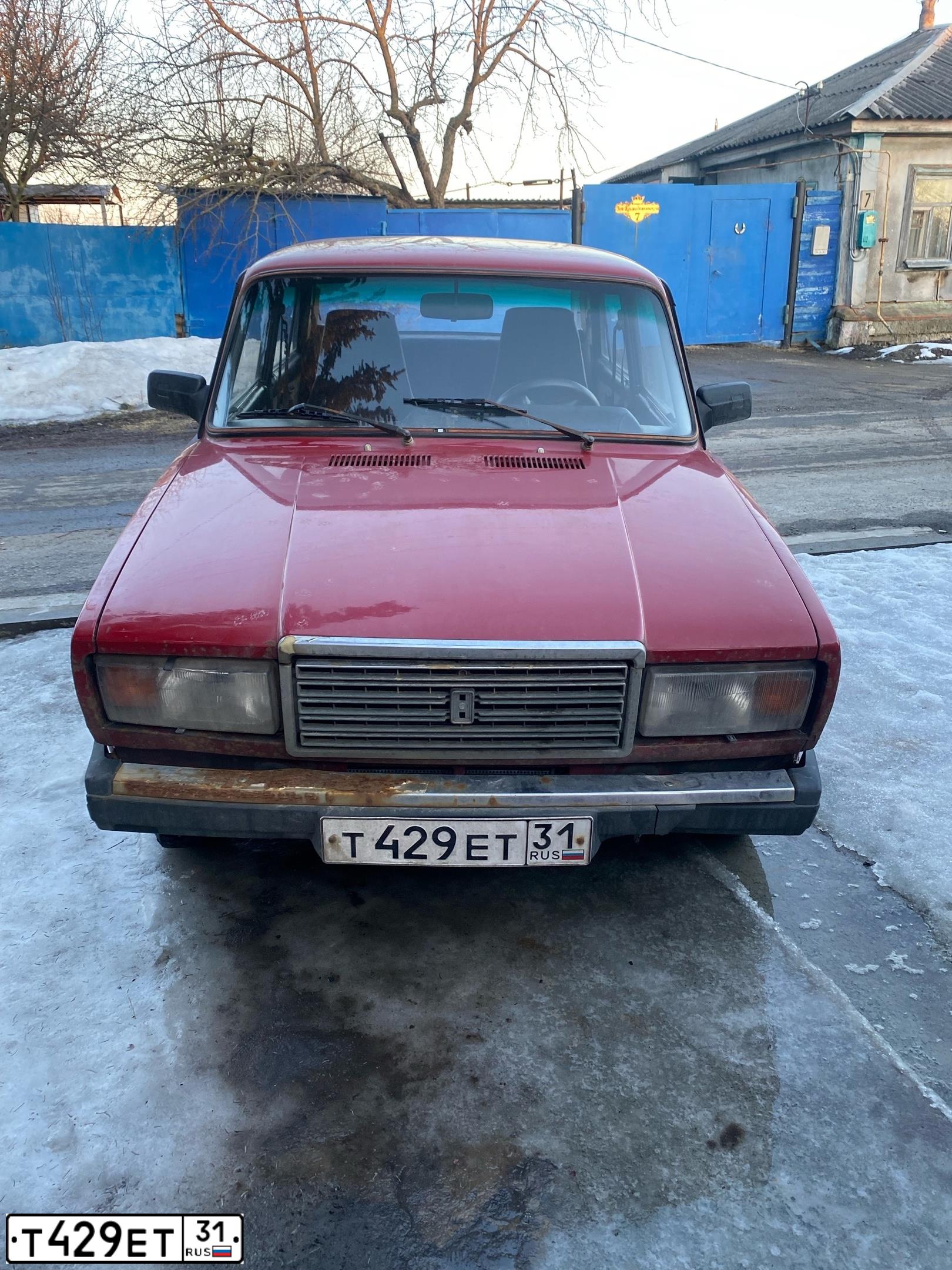 Фото автомобиля LADA 2107 LADA, 1995 — госномер Т429ЕТ31. Цвет: ВИШНЕВЫЙ