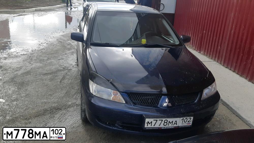 Фото автомобиля MITSUBISHI LANCER, 2006 — госномер М778МА102. Цвет: синий