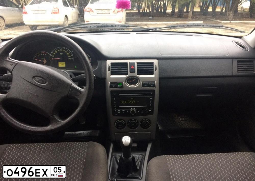 Фото автомобиля LADA PRIORA, 2012 — госномер Р586НЕ05. Цвет: средний серо-зеленый металлик