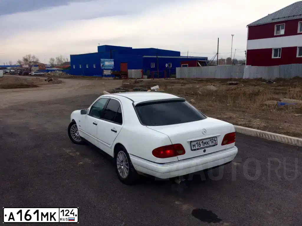 Фото автомобиля MAZDA 3, 2006 — госномер А161МК124. Цвет: ЧЕРНЫЙ