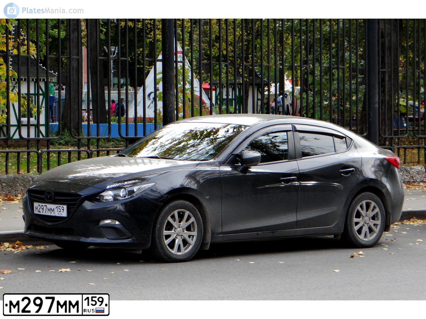Фото автомобиля MAZDA 3, 2014 — госномер Е123ТА159. Цвет: ЧЕРНЫЙ