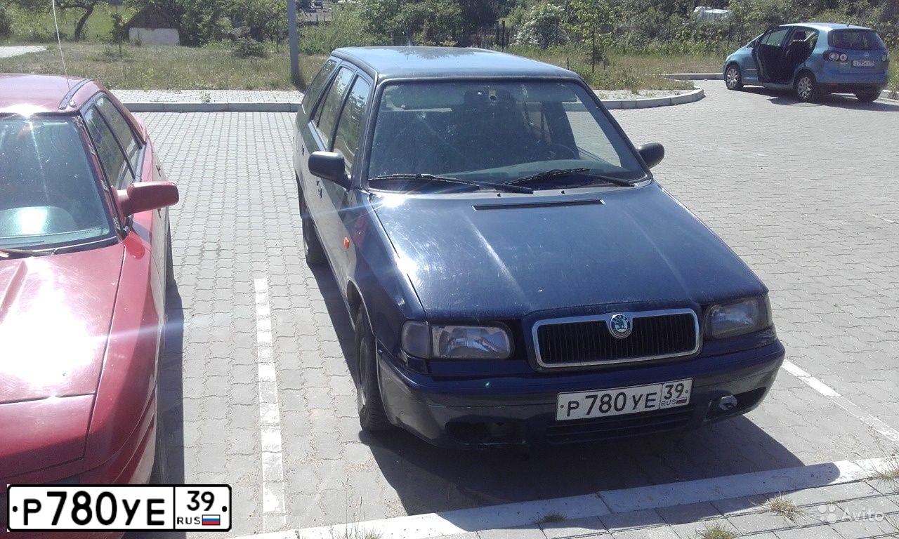 Фото автомобиля SKODA FELICIA, 1996 — госномер Т183КР199. Цвет: ТЕМНО СИНИЙ