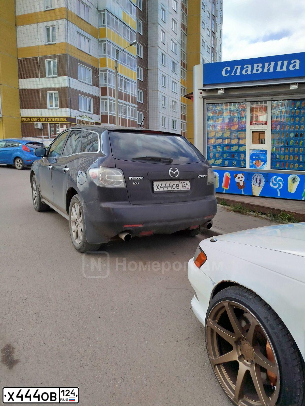 Фото автомобиля LADA 2172 PRIORA, 2010 — госномер М511ОТ124. Цвет: Сине-Черный