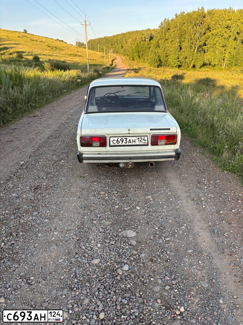 Фото автомобиля LADA 2105, 1994 — госномер С693АН124. Цвет: БЕЛЫЙ